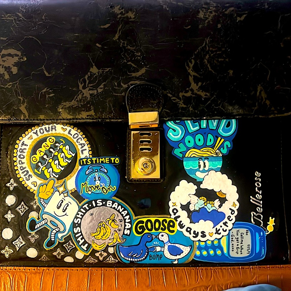 Vintage Black Briefcase with Colorful Graphic Stickers